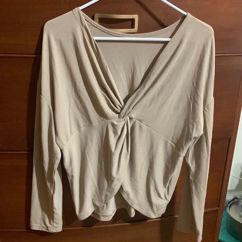 Beige open back long sleeve shirt
